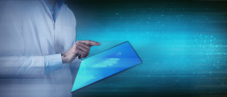 doctor holding a large transparent touch screenの写真素材