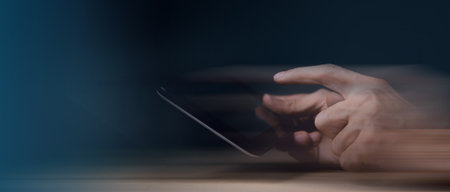 businessman holding tablet in hand