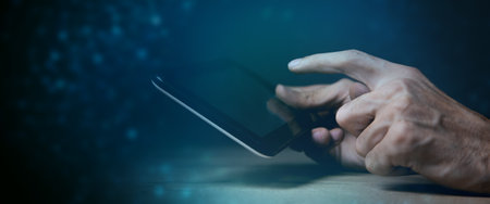 businessman holding tablet in hand