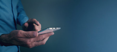 man using his mobile phone