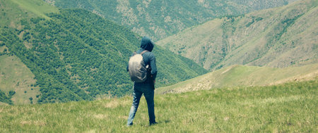 the photographer travels in nature and takes pictures