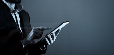 businessman holding tablet in handの写真素材