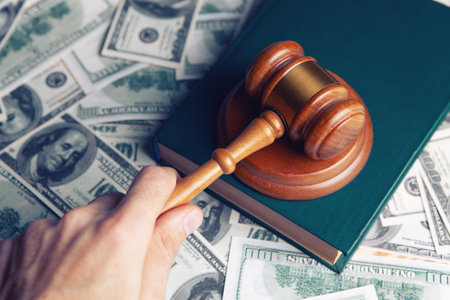 Judge gavel, dollars for business, finance, corruption, money, financial crimesの写真素材