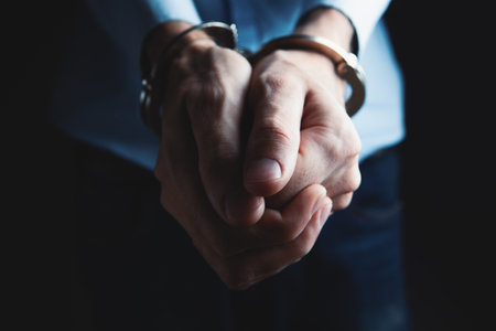 men handcuffed in criminal concept