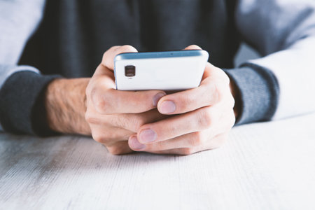 man using his mobile phone