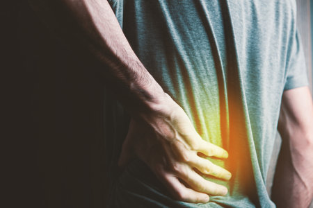 Man suffering from back pain