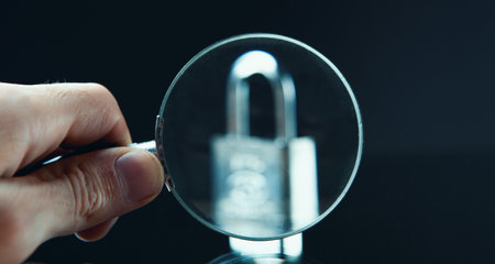 Keyboard with lock and magnifying glassの写真素材