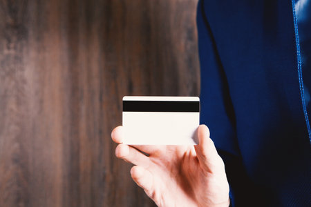 man holding a bank cardの写真素材