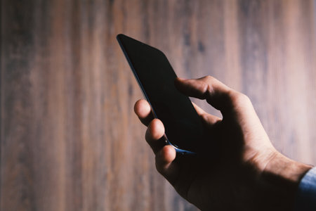 man using his mobile phoneの写真素材