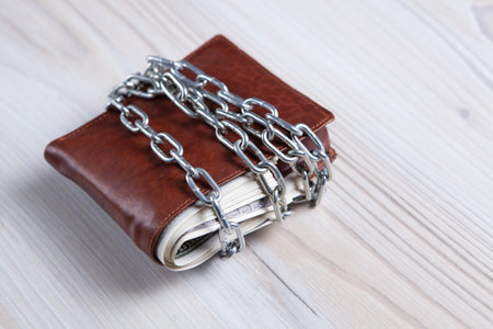 Padlock on the dollar bills. close up. business concept.