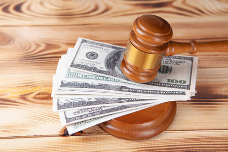 Hammer and money in court.の写真素材