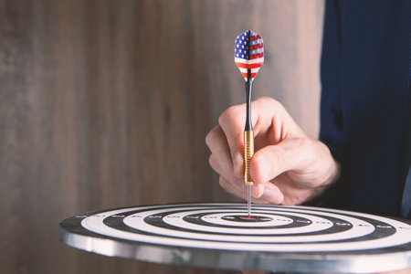businessman holding in hand target.