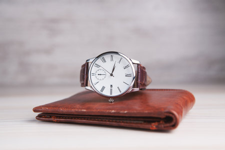 Wallet with the watch and copy spaceの写真素材