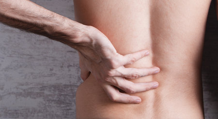 Man suffering from back pain
