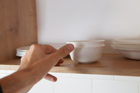 a man holding a dinner plateの写真素材