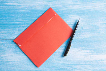 envelope with a pen on the table