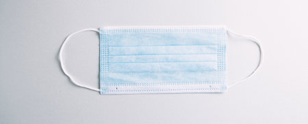 Blue surgical mask overhead view