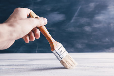 remove dust from the table with a brush