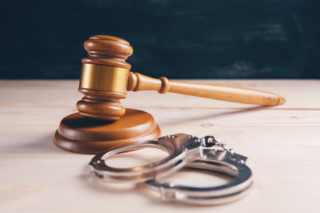 Legal law concept image - gavel and handcuffsの写真素材