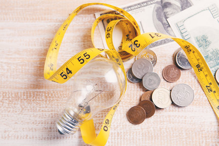 coins with money, and with a centimeter of reconciliation wealthの写真素材
