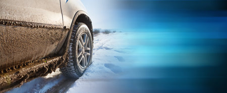 The four-wheel drive car of the modern SUV remains on the side of the winter road.