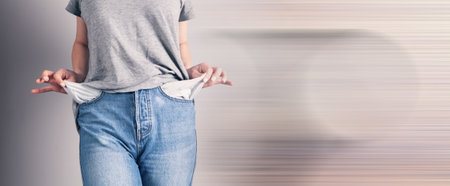 girl shows her empty pockets.