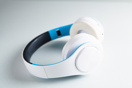 white headphones on the table