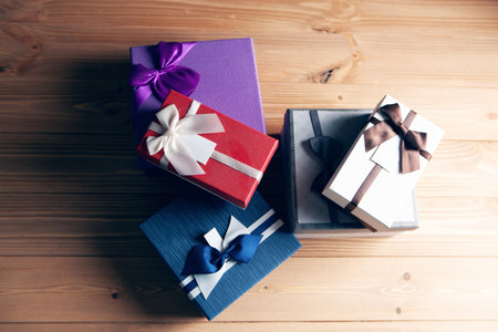 a pile of gift boxes on the table