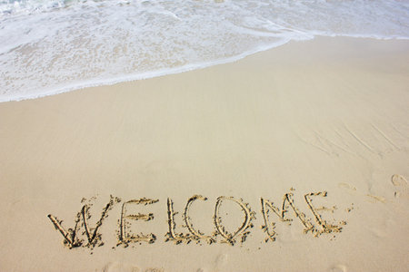 beach sand lettering welcome to dubaiの写真素材