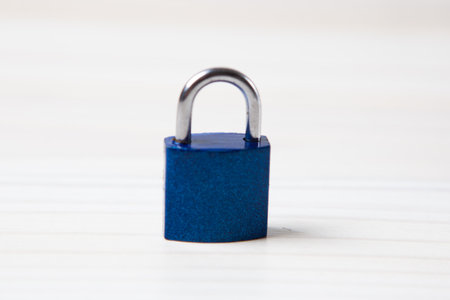 lock on a wooden tableの写真素材