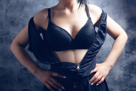 Young Woman Sexy Stands In Lingerieの写真素材