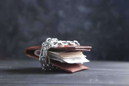 leather wallet closed with chainの写真素材