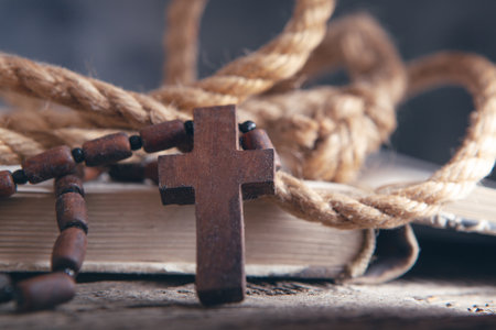 open book and cross on the table