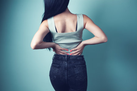 young woman has kidney painの写真素材