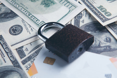 bank card and lock on moneyの写真素材