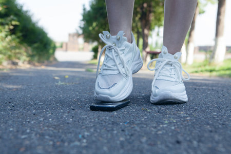 accidentally stepped on the phoneの写真素材