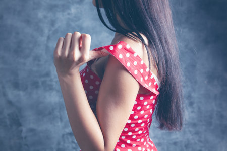 woman sexually takes off her clothesの写真素材