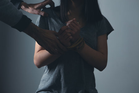 the man tied the woman's hands. concept of violenceの写真素材