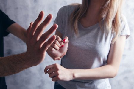 the husband wants to hit his wife. domestic violenceの写真素材
