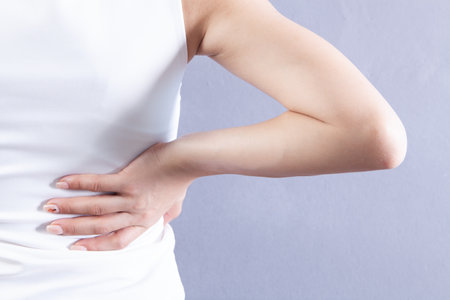 young woman has kidney pain