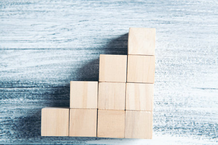 wooden cubes in the form of a ladderの写真素材