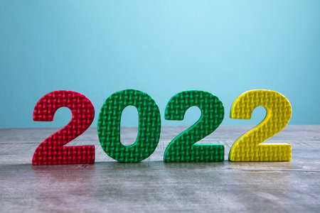 multicolored numbers 2022 on a blue backgroundの写真素材