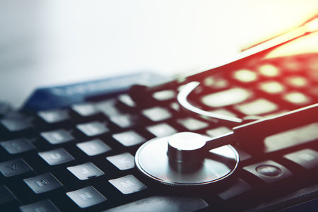 stethoscope on the keyboard. technical support