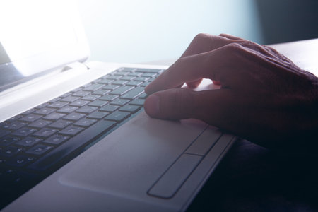 a man working on a laptopの写真素材