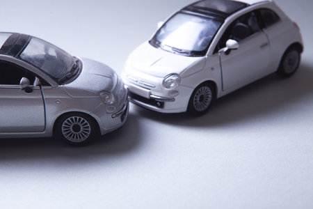 two cars collided, insurance. on the tableの写真素材