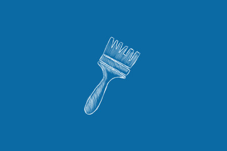 drawn paintbrush on a blue backgroundの写真素材