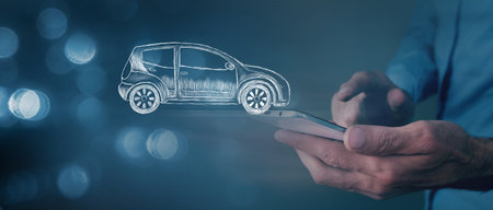 a man presses on the phone on a drawn car