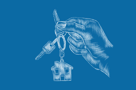 drawn hand holding house keysの写真素材