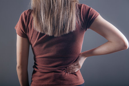 young woman has kidney pain