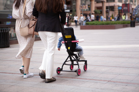 young mother walks with a child